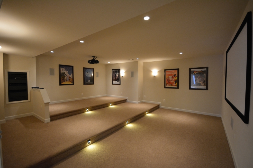 The basement media room (16'-0" by 15'-8").