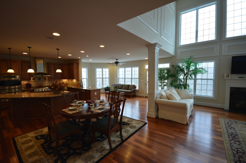 The main floor of the Hampton floor plan uses open space and upgraded finishes as standard features.