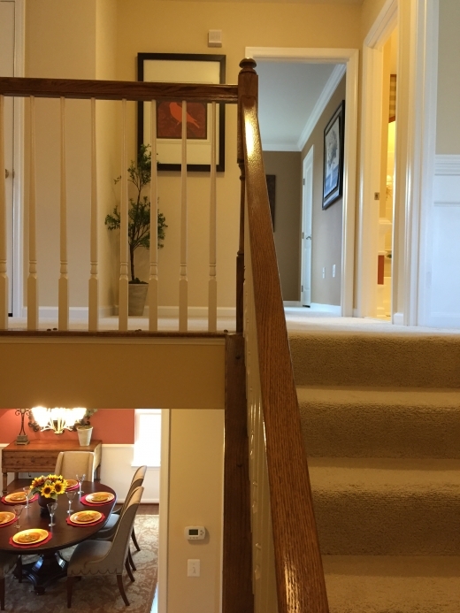 The stairway between the main and second floors.