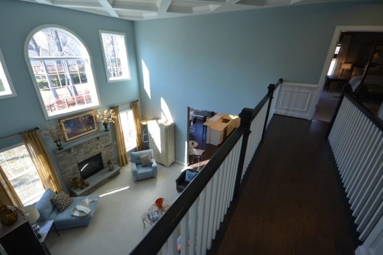The view of the family room from the second floor hallway.