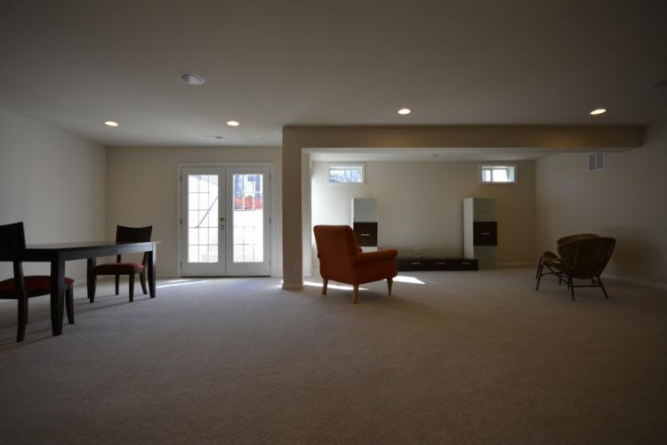The basement recreation room (11'-8" by 13'-4").