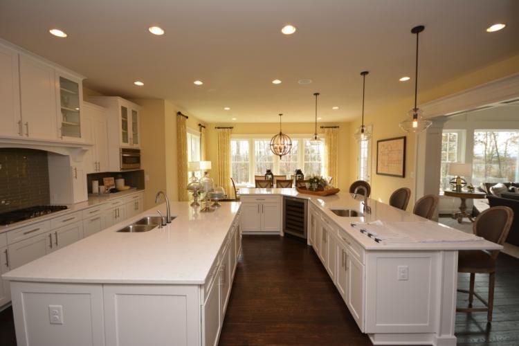 There are 2 kitchen islands shown here. The larger island is an upgrade.