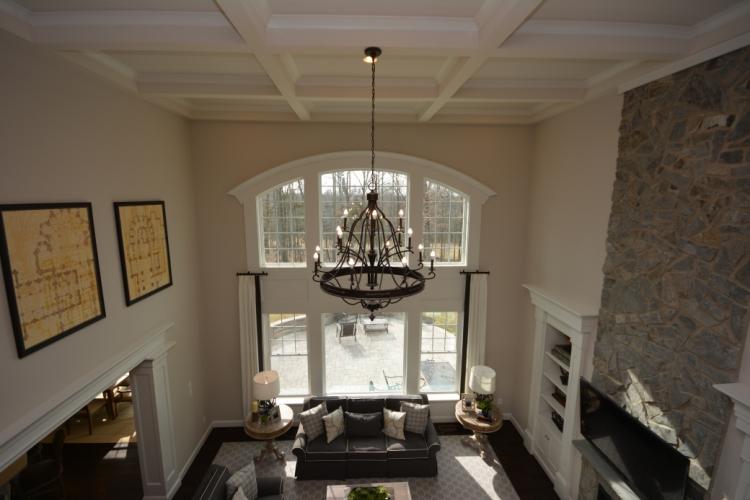 The view of the two-story family room from the second floor hallway.