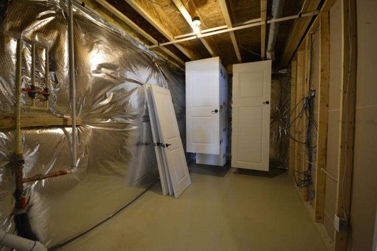 Unfinished basement storage room.