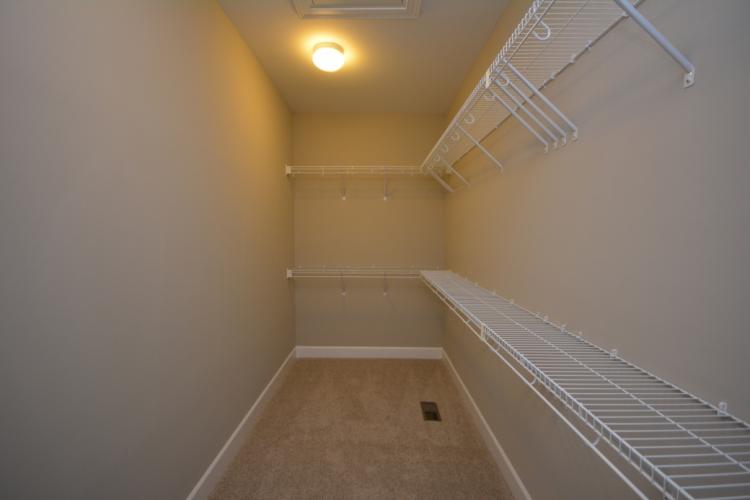 The second walk-in closet in the master bedroom.
