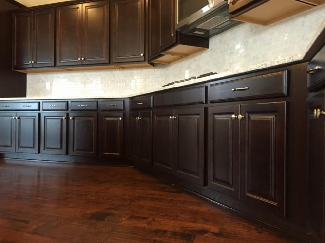 The cabinetry of the gourmet kitchen.