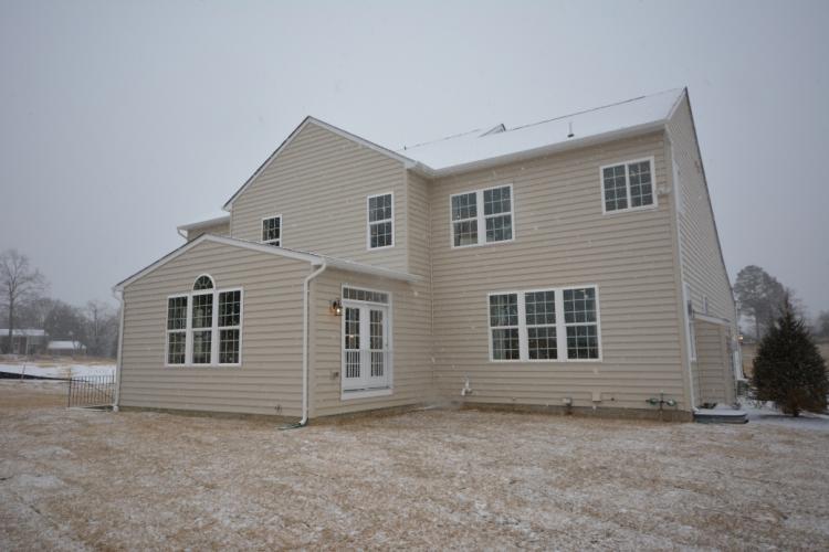 The rear exterior view of the Sutton home design.