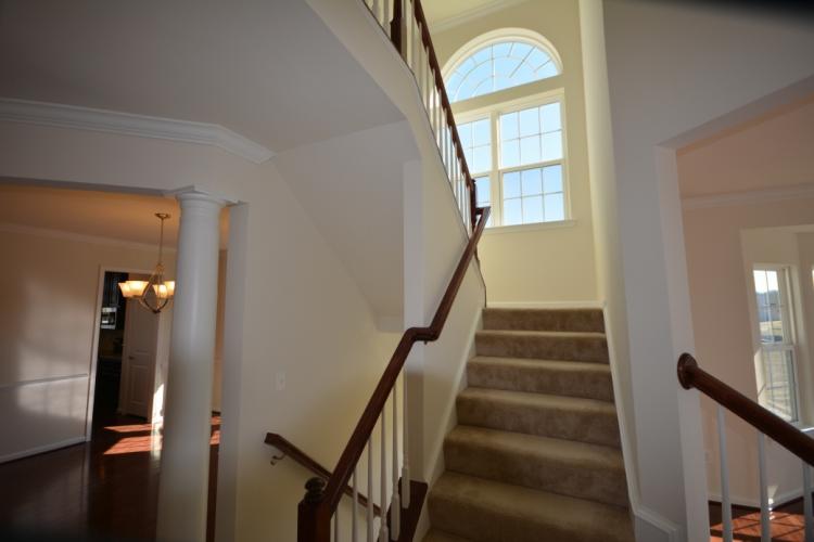 The stairs leading to the second floor.