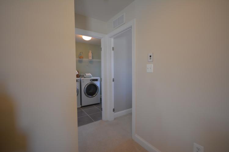 The second floor laundry room and bedroom #2