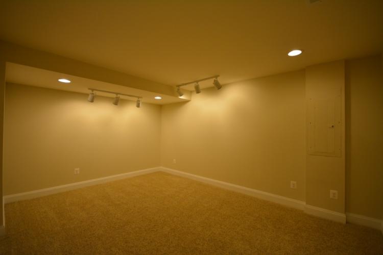 The basement exercise room (11'-8" by 15'-4").
