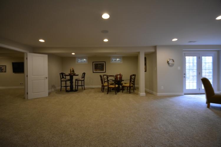 The basement recreation room (32'-5" by 14'-4").