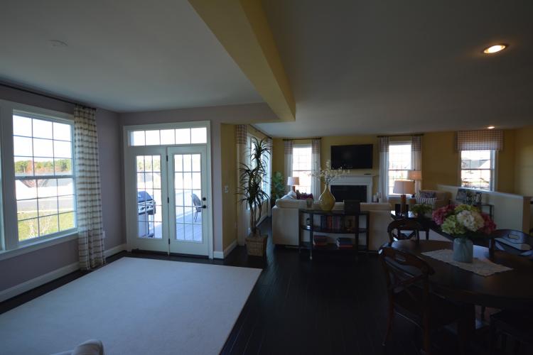 The Claremont sun room and family room.