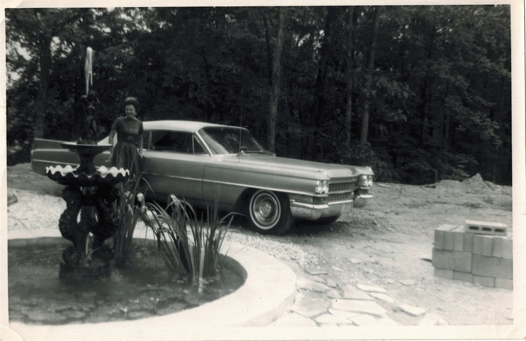 Mrs. Alice Purse at "Alvictus" with a 1960 Cadillac. This photograph was taken at 8351 Purse Drive in Lake Jackson near Manassas, Virginia.