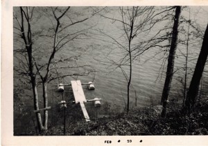 The "Happy House" was a simple lake front cabin with simple amenities. This 1959 photograph shows the boat dock before the summer retreat was transformed into a luxury home.