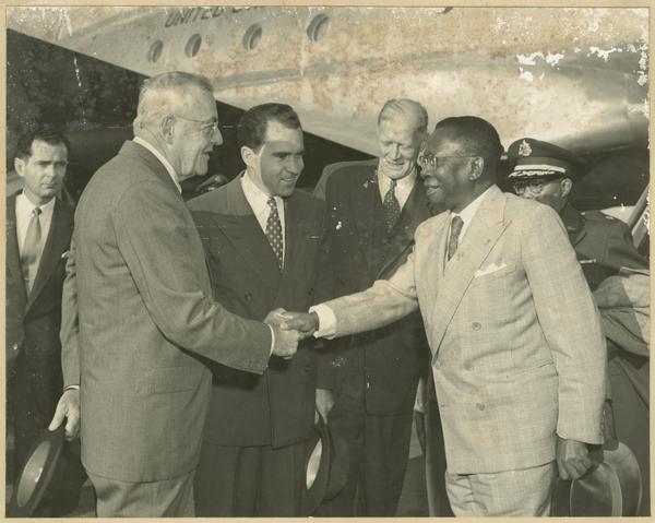 Foreign dignitary William V. S. Tubman, President of Liberia visits the United States and is greeted by Vice President Richard Nixon.