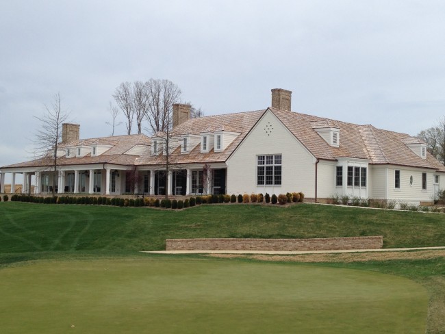 The 18th green and clubhouse at Potomac Shores Club Club in the northern neighborhoods of Potomac Shores master-planned communities.