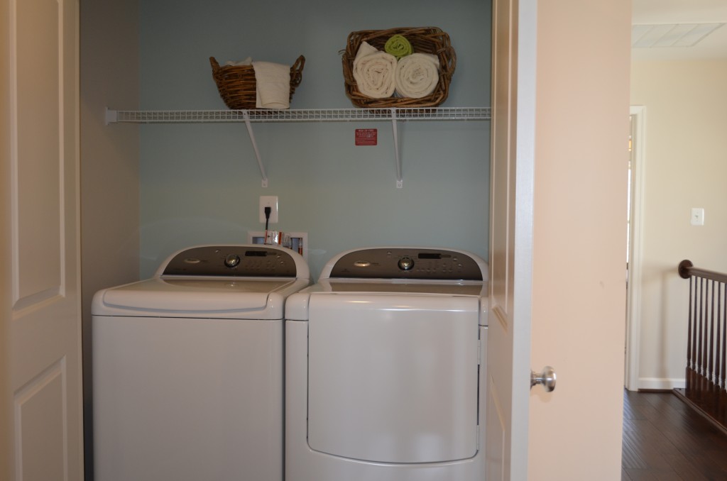 This is the second floor hallway laundry closet in the Manor Paxton town home by Winchester Homes. This townhouse is at the Glenmere and Emerald Ridge communities at Brambleton in Ashburn, Virginia (Loudoun County).