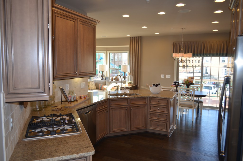This is the gourmet kitchen in the Easton luxury town home at the Manors at Moorefield Green. This home has 3,000 finished square feet, 2 car garage, and optional rooftop terrace with loft or fourth bedroom on the fourth floor. This Toll Brothers home is 1 mile from the Dulles Airport Silver Line Metro Station.