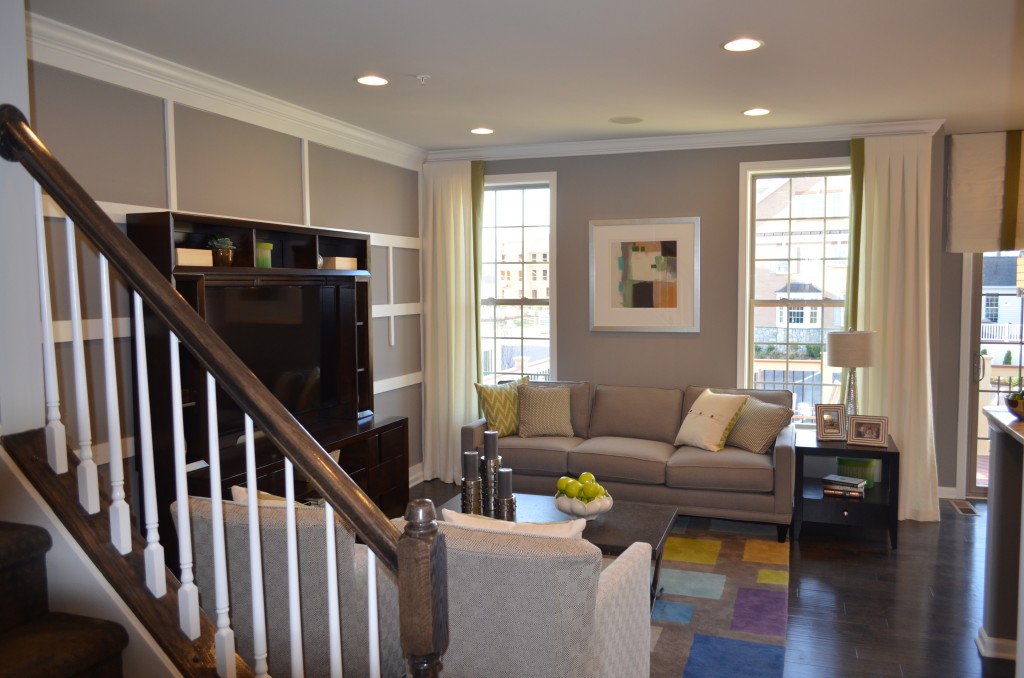 The family room in the Bethesda luxury townhouse by Toll Brothers in the Manors at Moorefield Green in Ashburn, Virginia.