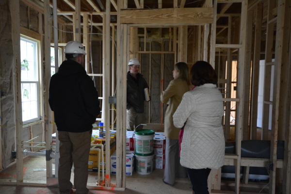 This is an electrical inspection before drywall of the Springhaven home design by Ryan Homes. The project manager(s), client, and Maryanne Moyers are pictured here.