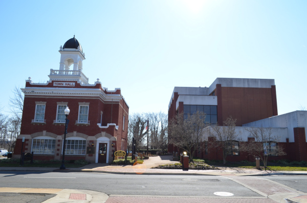 The Harry J. Parrish Town Hall Building (left) and Manassas City Hall Building (right) at 9025 and 9027 Center Street (respectively) in the City of Manassas.