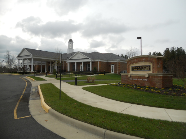 This is the Virginia Heritage at Lee's Parke community center. It has a fitness center with state-of-the-art equipment, steam showers, hot tubs, aerobics room for exercise classes, ballroom, lounge, billiards room, card rooms, activity rooms, library, and internet stations. There is a full-time activities director for community clubs, trips, and classes. Shopping, hiking, line dancing, card games, gardening, yoga, water workouts, and tours of nearby historic attractions are among many coordinated events at Virginia Heritage. The Virginia Heritage Community Center serves the residents living in the 795 homes in this active adult community spread over 416 acres.