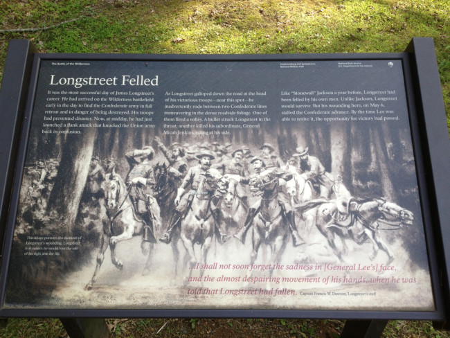 This National Park Service interpretive marker of the Battle of the Wilderness titled 'Longstreet Felled' is on Orange Plank Road across from Forest Walk Drive in Spotsylvania County.