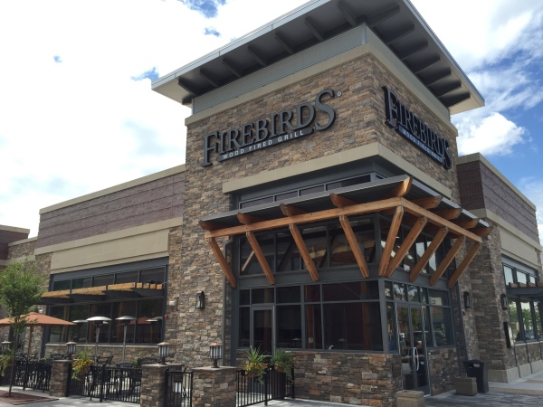 Firebirds Wood Fired Grill at Spotsylvania Towne Centre offers American cuisine specializing in steaks and seafood and a gluten free menu. The bar offers several wines, seasonal and signature cocktails, beers and after dinner drinks.
