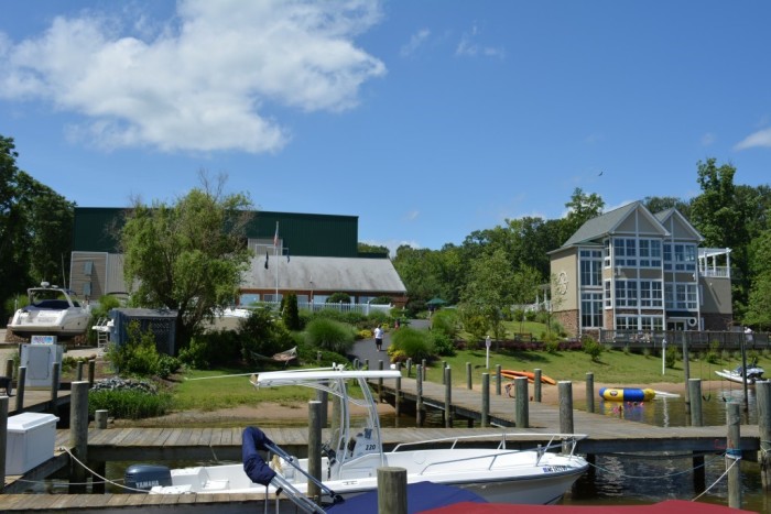 The sales and service center and boat storage warehouses are on the left, while the clubhouse is on the right.