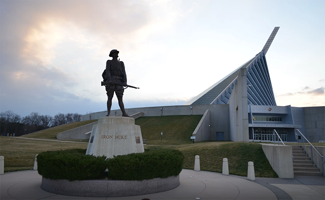 The National Museum of the Marine Corps is a lasting tribute to U.S. Marines--past, present, and future. Situated on a 135-acre site adjacent to Marine Corps Base Quantico, Virginia, and under the command of Marine Corps University, the Museum's soaring design evokes the image of the flag-raisers of Iwo Jima and beckons visitors to this 120,000-square-foot structure. World-class interactive exhibits using the most innovative technology surround visitors with irreplaceable artifacts and immerse them in the sights and sounds of Marines in action. The Museum is a public-private partnership between the U.S. Marine Corps and the Marine Corps Heritage Foundation. The Foundation was established in 1979 as a non-profit 501(c)(3) organization to support the historical programs of the Marine Corps in ways not possible through government funds. The Foundation’s current primary mission is to secure the necessary funding to complete the construction of the National Museum of the Marine Corps. They also support the Museum's volunteer and educational programs.