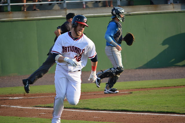 Bryce Harper headed to second while rehabilitating with the Carolina League Potomac Nationals before his 2013 M. L. B. All-Star Game and Home Run Derby appearance.